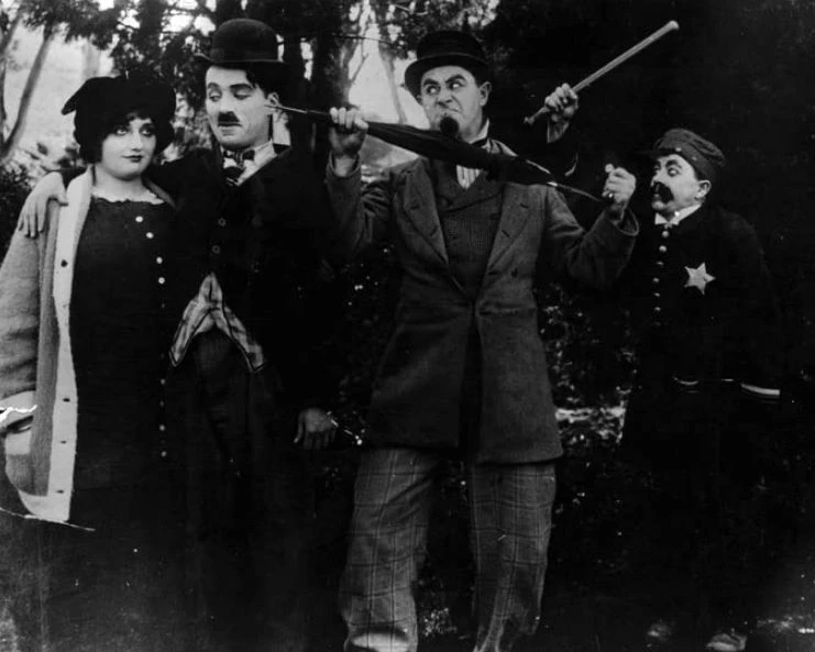 Chaplin a deštník (1914)