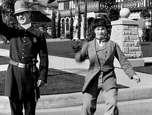 Chaplin a deštník (1914)