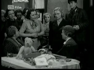 Děvče za výkladem (1937)