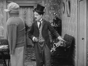 Chaplin pod pantoflem (1914)
