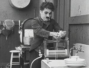 Chaplin odhadcem v zastavárně (1916)