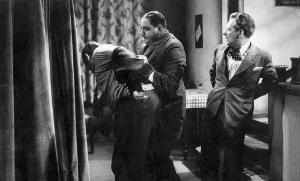 Záhadný host (1936)